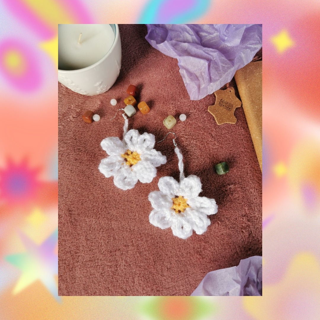 white and yellow crochet daisy earrings with silver hooks