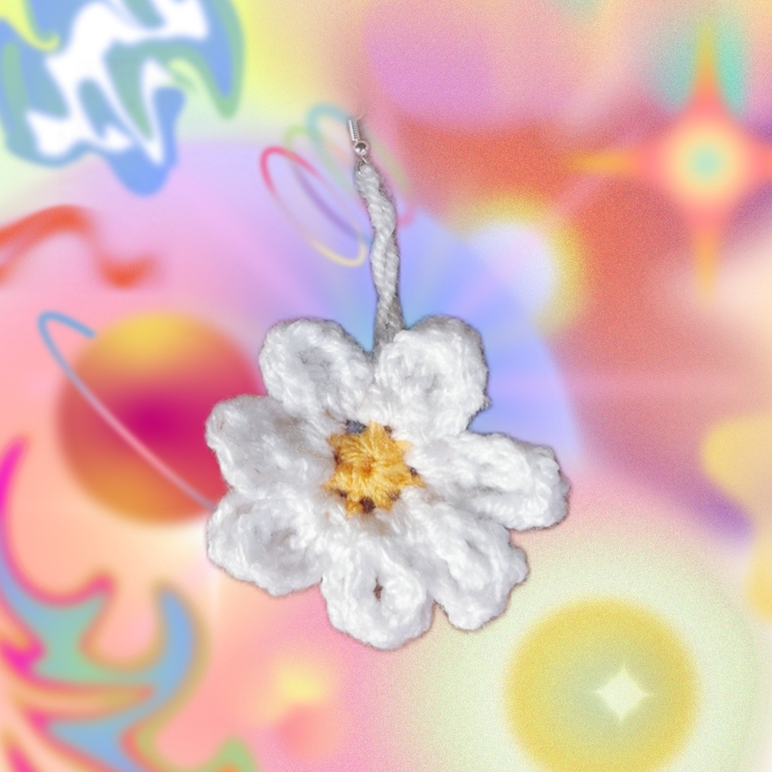 white and yellow crochet daisy earrings with silver hooks